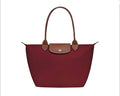 Longchamp súper dupe vino