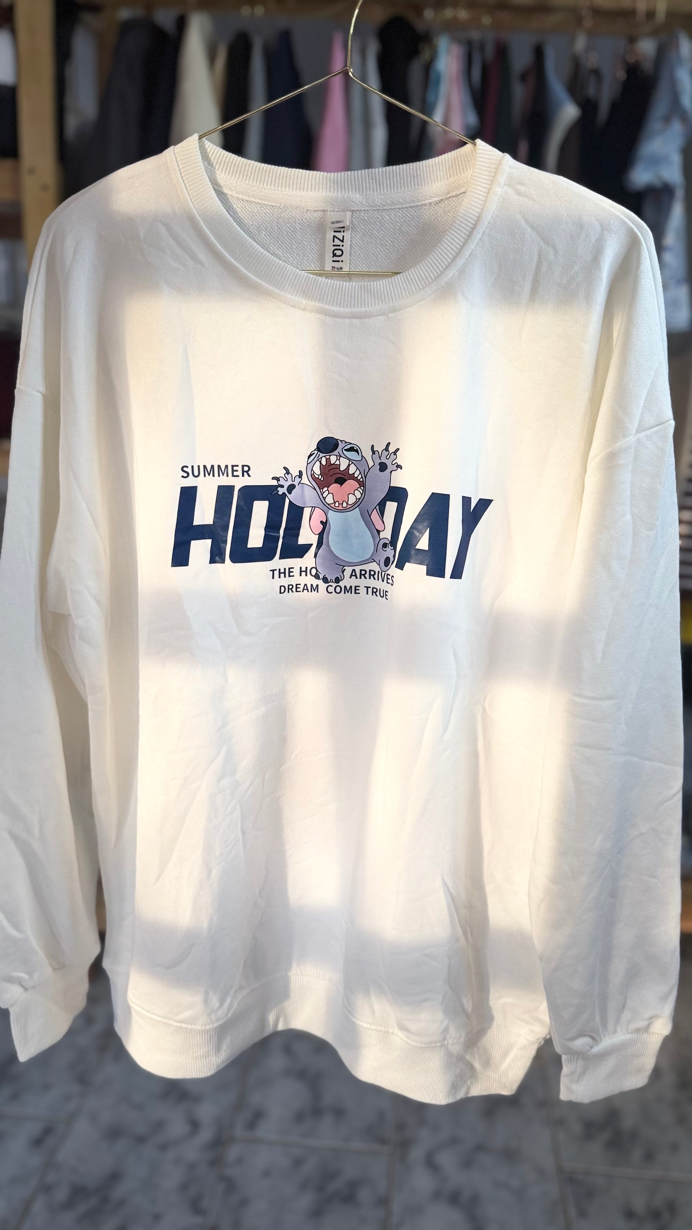 Stitch Holiday suéter